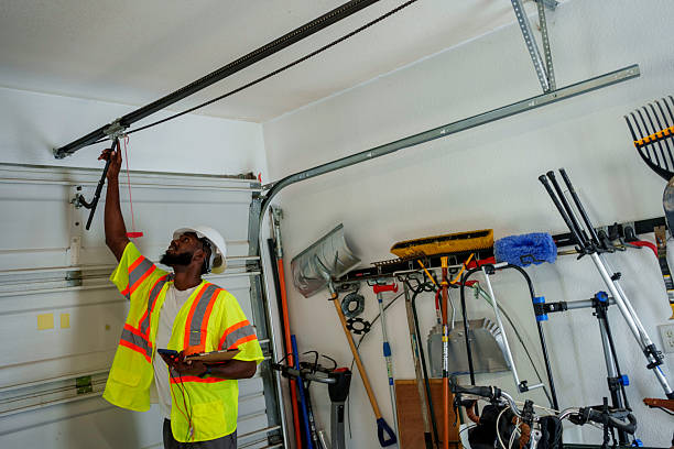 Professional Garage Door Roller Replacement technician working in Trainer, PA